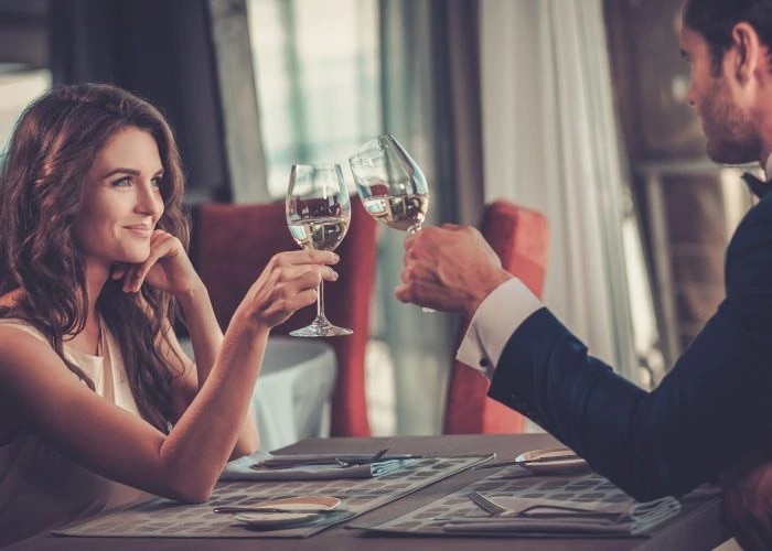 couple drinks wine in the restaurant